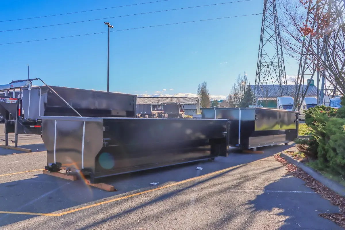 Roll-off dumpster ready for waste disposal at job site for Commercial Dumpster Rental in Birch Run